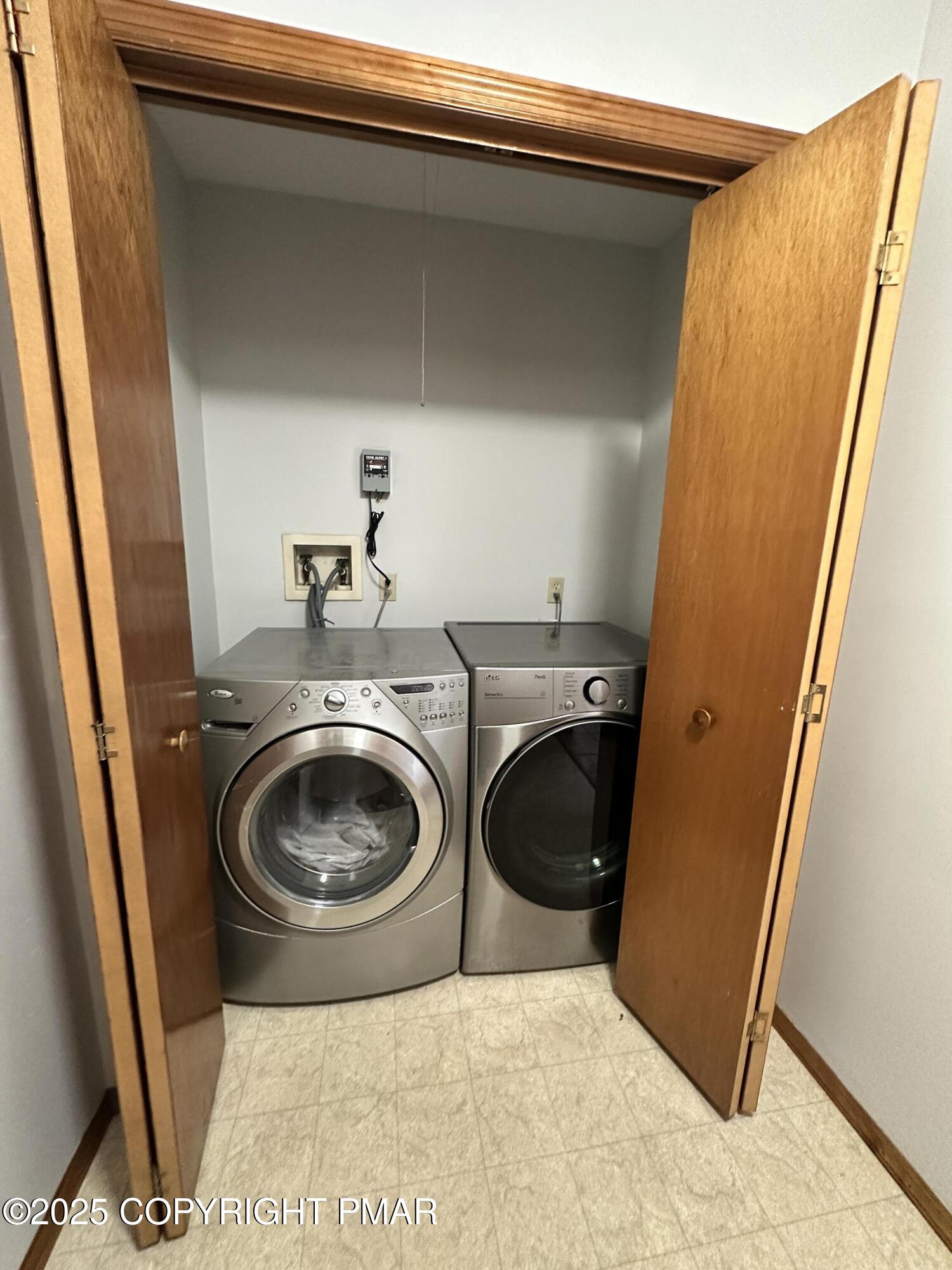 164 Alpine Road Henryville, PA 18332 - Photo 21 of 49 a utility room with a sink a washer and dryer