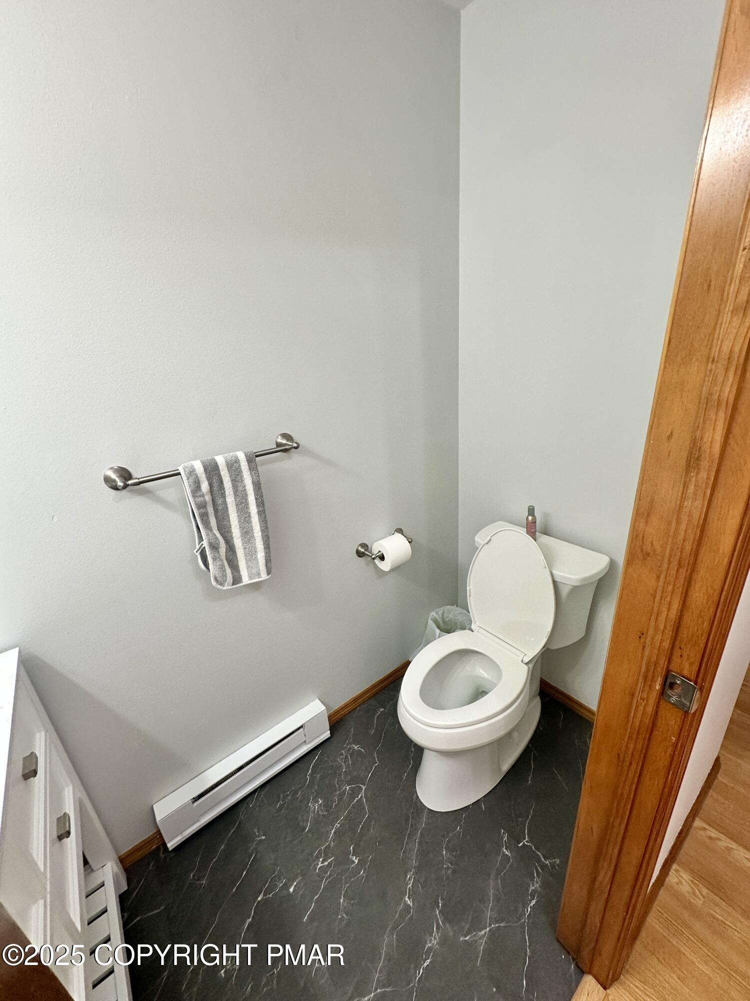 164 Alpine Road Henryville, PA 18332 - Photo 28 of 49 a white toilet sitting next to a bathroom sink