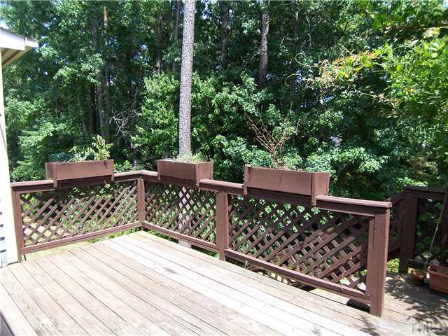 118 Timber Ridge Drive Durham, NC 27713 - Photo 11 of 12 Back deck has great green views! The home owner association has replaced this deck with brand new decking - new photo not yet available - so look around the neighborhood when visiting to see all the work in progress! Back Yard