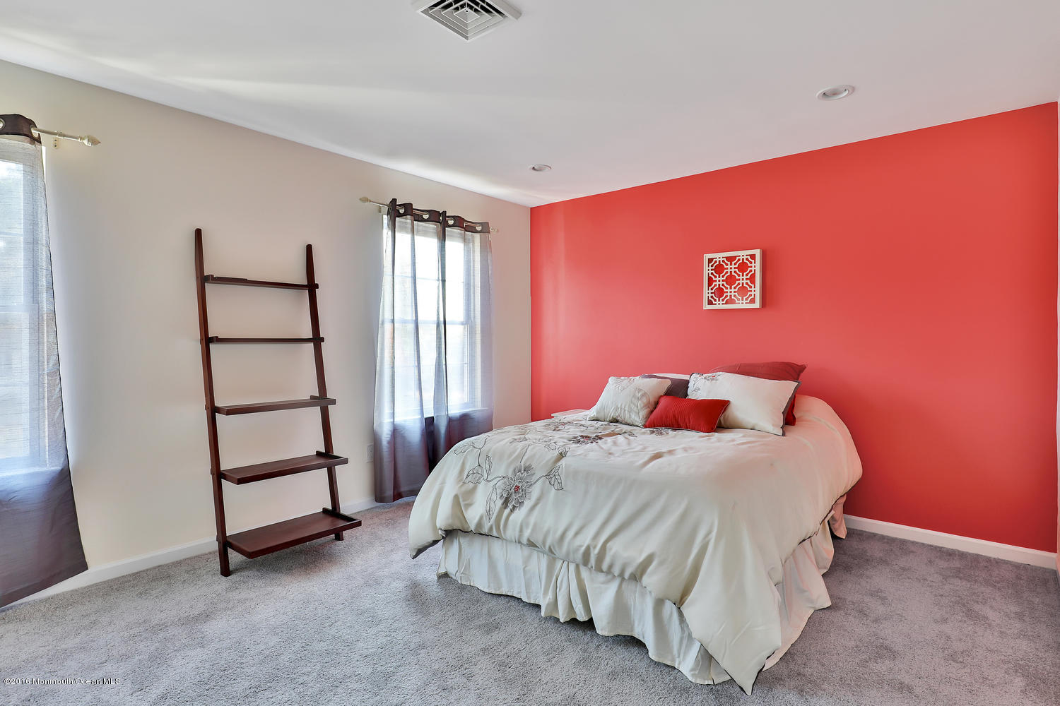 112 Seaspray Road Manahawkin, NJ 08050 - Photo 19 of 21 a bedroom with a bed and a window