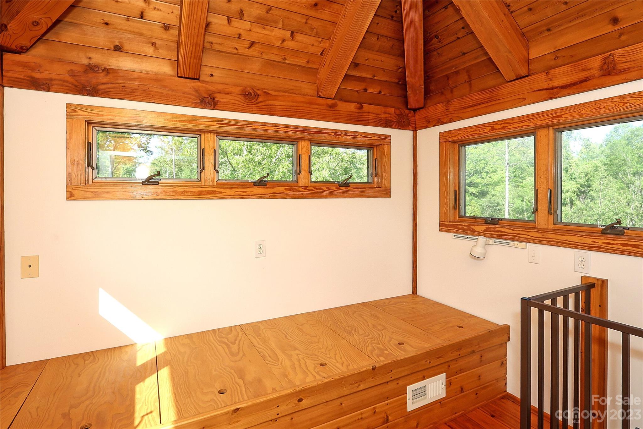 9616 Mini Ranch Road Waxhaw, NC 28173 - Photo 23 of 46 a view of a room with wooden floor and a window
