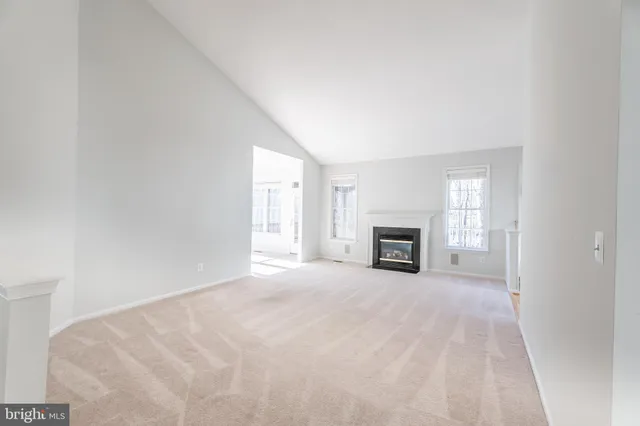 a view of a balcony with wooden floor