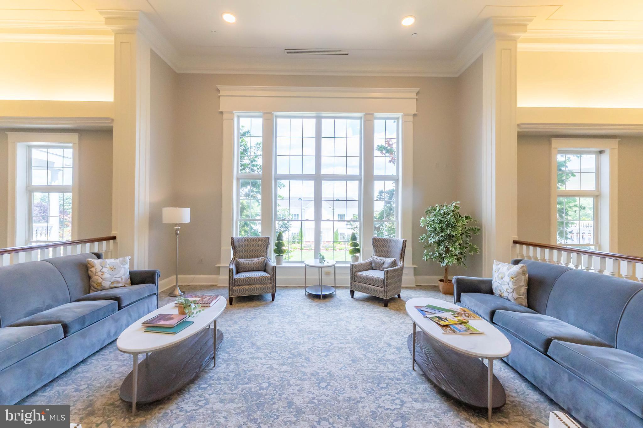 6880 Saddle Run Way Gainesville, VA 20155 - Photo 42 of 57 Beautiful gathering spaces in the clubhouse.