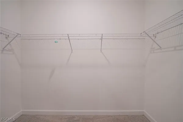 a view of a room with a large window