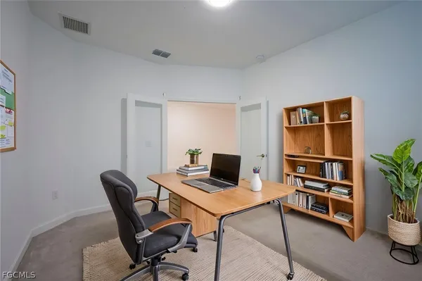 an aerial view of a houses with outdoor space