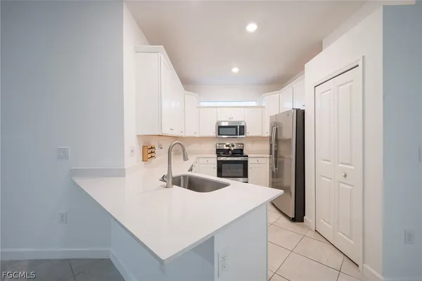 a bathroom with a sink and a vanity