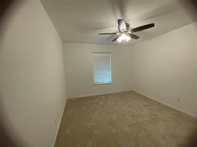 a bathroom with a double vanity sink and mirror