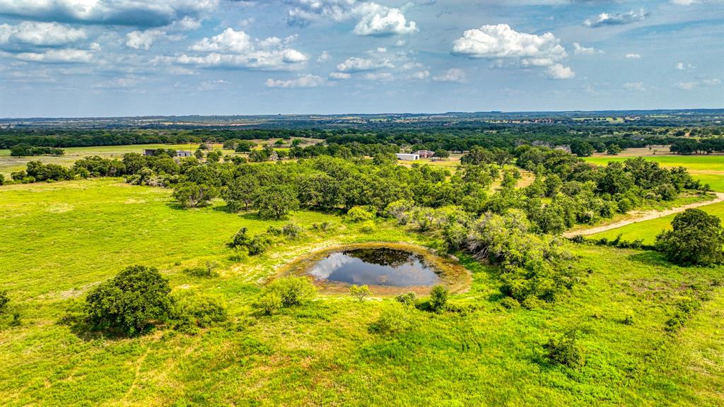 11500 Bowden Road Lipan, TX 76462 - Photo 12 of 32 Drone / aerial view featuring a water view