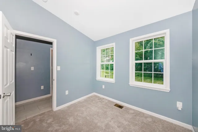 an empty room that has a window