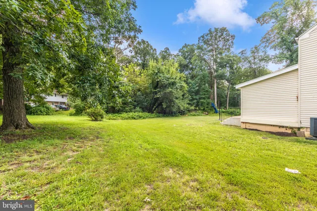a view of a backyard with a garden