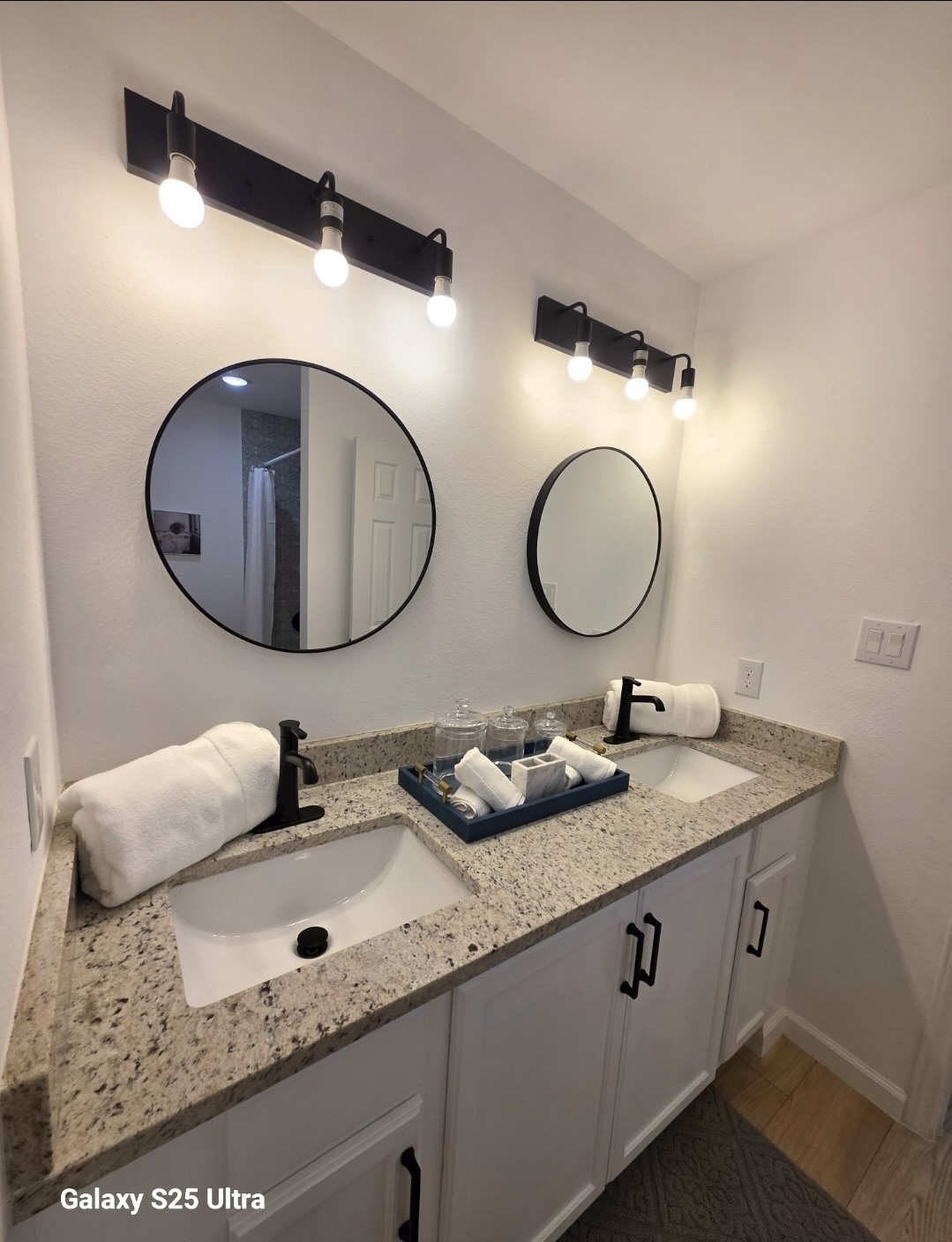 620 St Lawrence River Road Conroe, TX 77316 - Photo 10 of 21 a bathroom with a granite countertop sink and a mirror