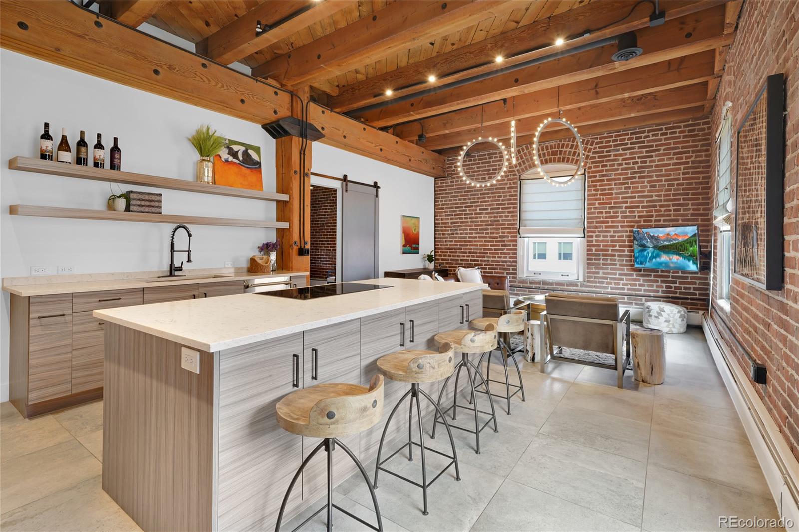 a kitchen with a table chairs and a stove