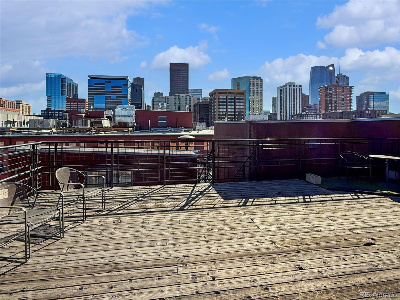 1792 Wynkoop Street, Unit 307 Denver, CO 80202 - Photo 19 of 26 a view of a terrace with wooden floor