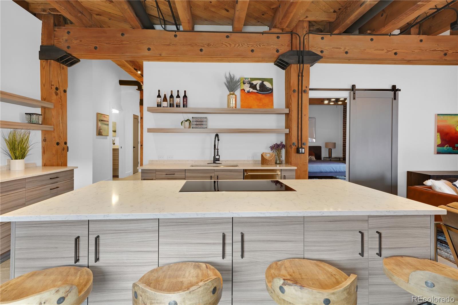 1792 Wynkoop Street, Unit 307 Denver, CO 80202 - Photo 2 of 26 a view of a kitchen with stainless steel appliances granite countertop a sink and cabinets