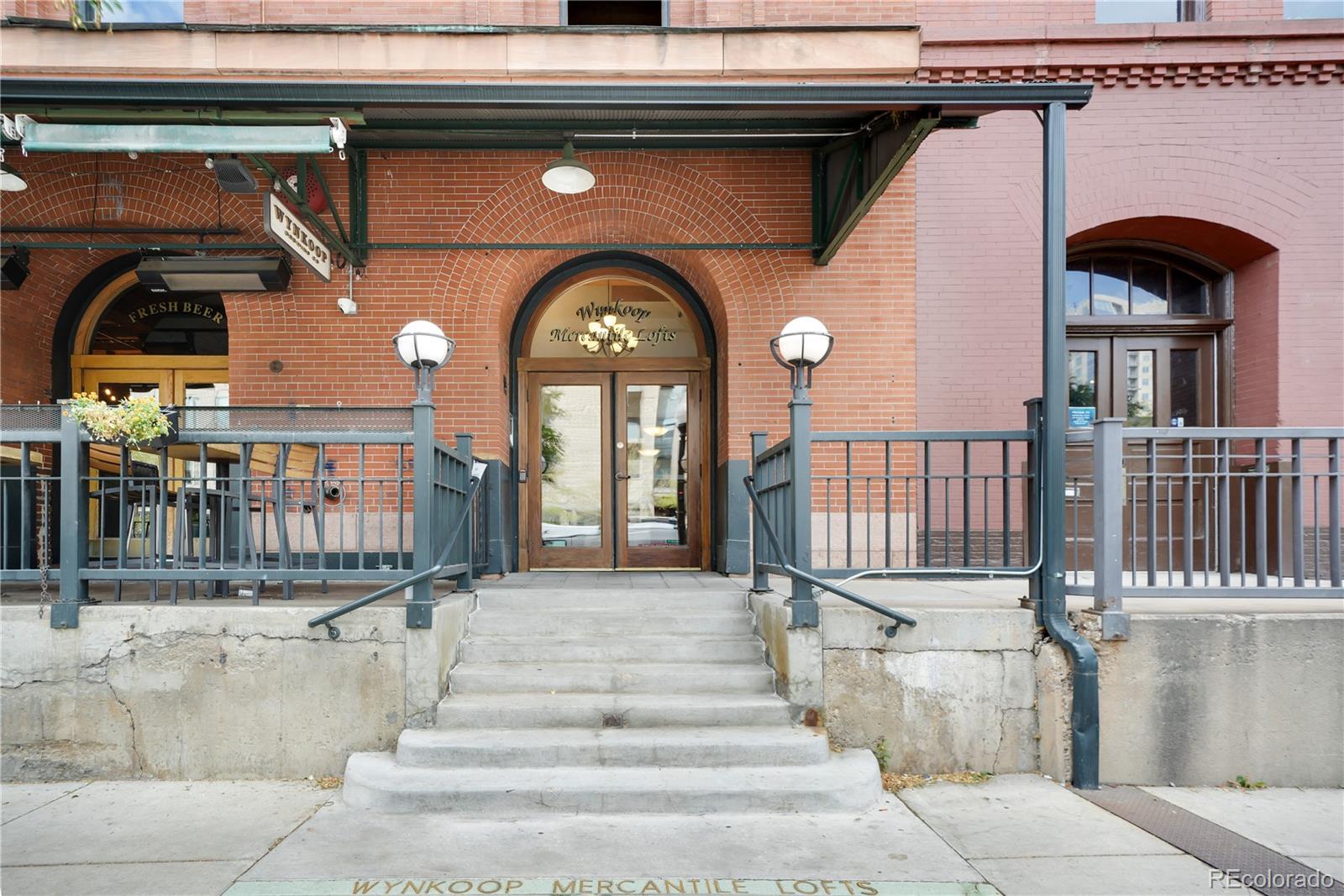 1792 Wynkoop Street, Unit 307 Denver, CO 80202 - Photo 22 of 26 a view of entryway and hall with wooden floor