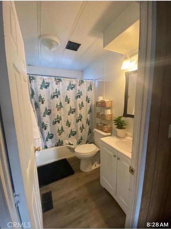 499 Pacheco Road, Unit 214 Bakersfield, CA 93307 - Photo 8 of 8 a bathroom with a sink a toilet and shower