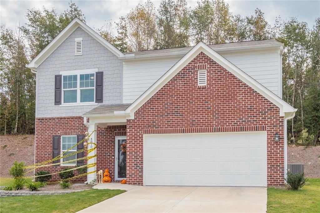 Beautiful home built in 2018 has 2 car garage, cement siding & brick front.