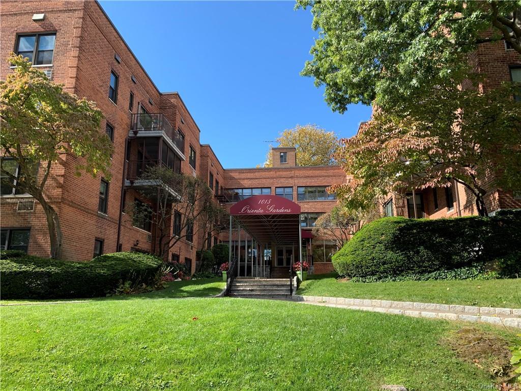 1015 Old Boston Post Road, Unit 3R Mamaroneck, NY 10543 - Photo 1 of 1 View of property's community featuring a yard