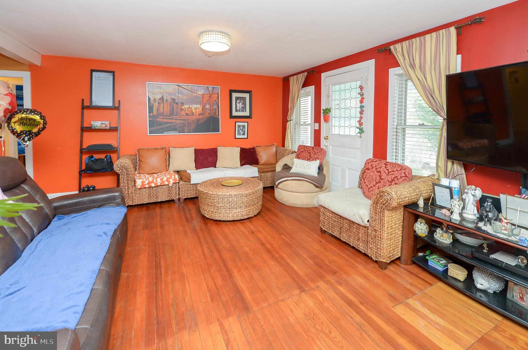 922 Route 601 Skillman Nj 08558 Skillman, NJ 08558 - Photo 17 of 59 a living room with furniture and a flat screen tv