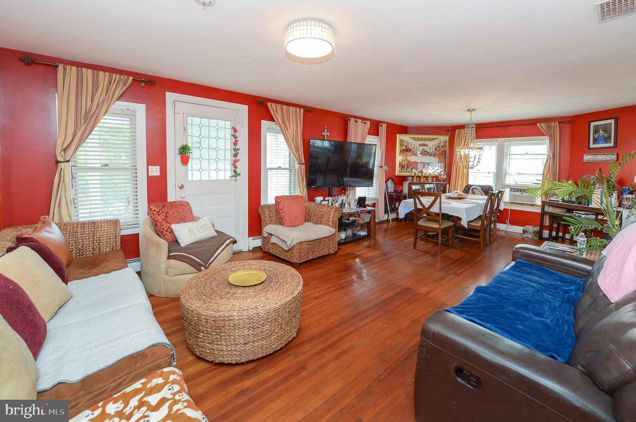 922 Route 601 Skillman Nj 08558 Skillman, NJ 08558 - Photo 19 of 59 a living room with furniture and a flat screen tv