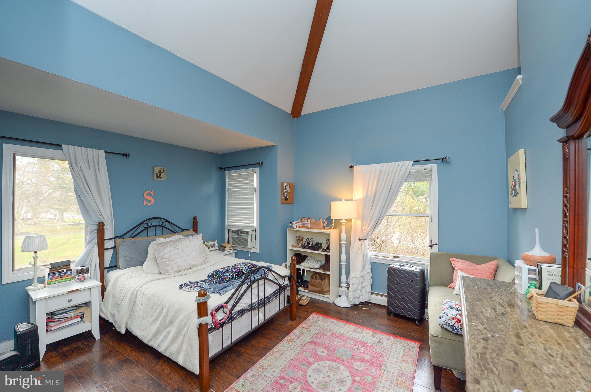 922 Route 601 Skillman Nj 08558 Skillman, NJ 08558 - Photo 22 of 59 a bedroom with a bed wooden floor and window