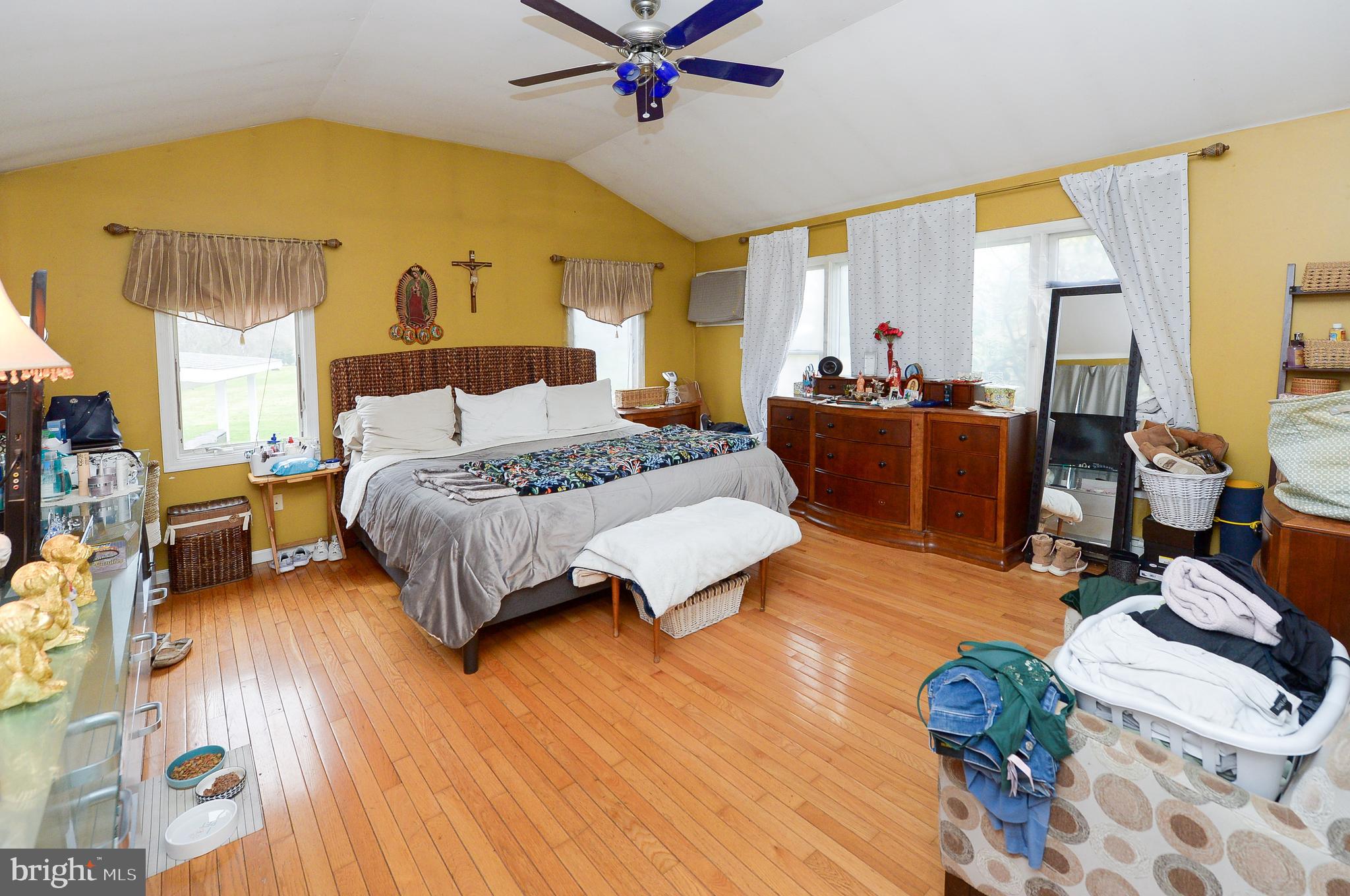 922 Route 601 Skillman Nj 08558 Skillman, NJ 08558 - Photo 29 of 59 a bedroom with a bed and wooden floor