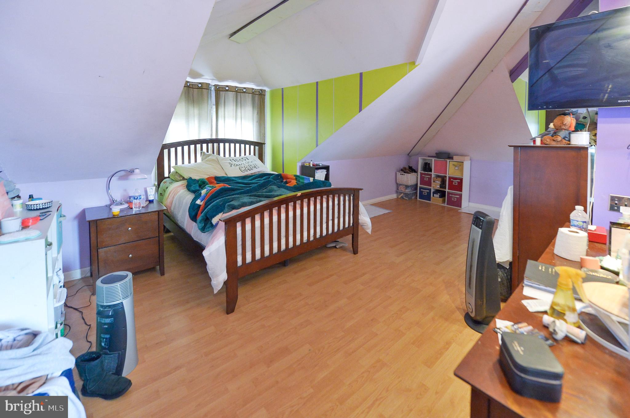 922 Route 601 Skillman Nj 08558 Skillman, NJ 08558 - Photo 33 of 59 a bedroom with furniture and a wooden floor