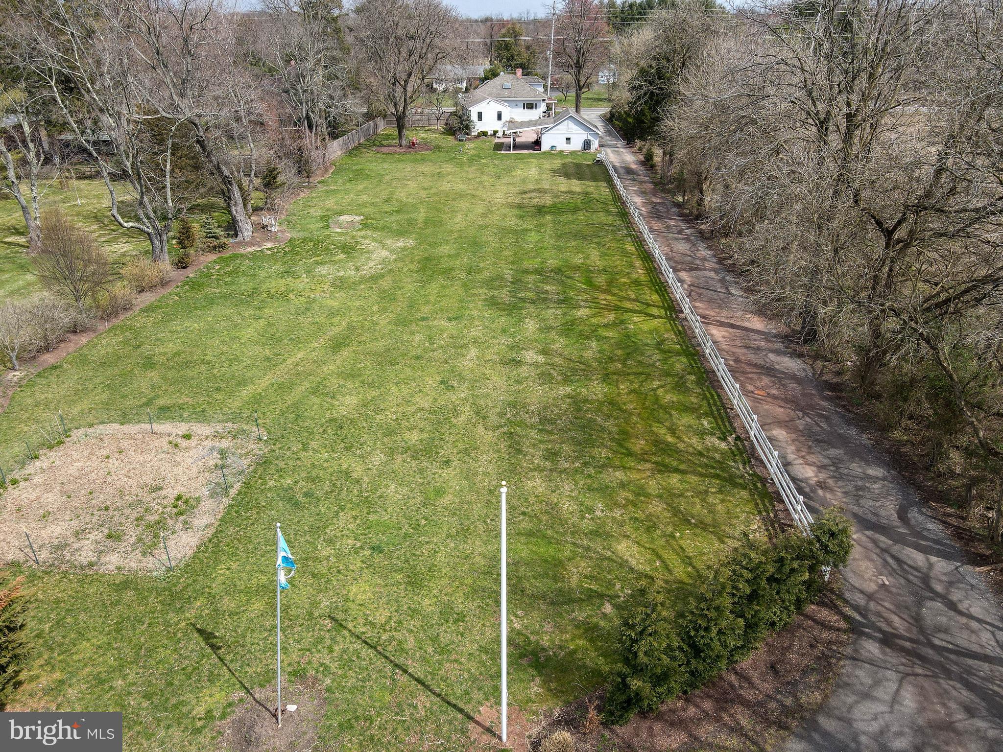 922 Route 601 Skillman Nj 08558 Skillman, NJ 08558 - Photo 52 of 59 a backyard of a house with lots of green space