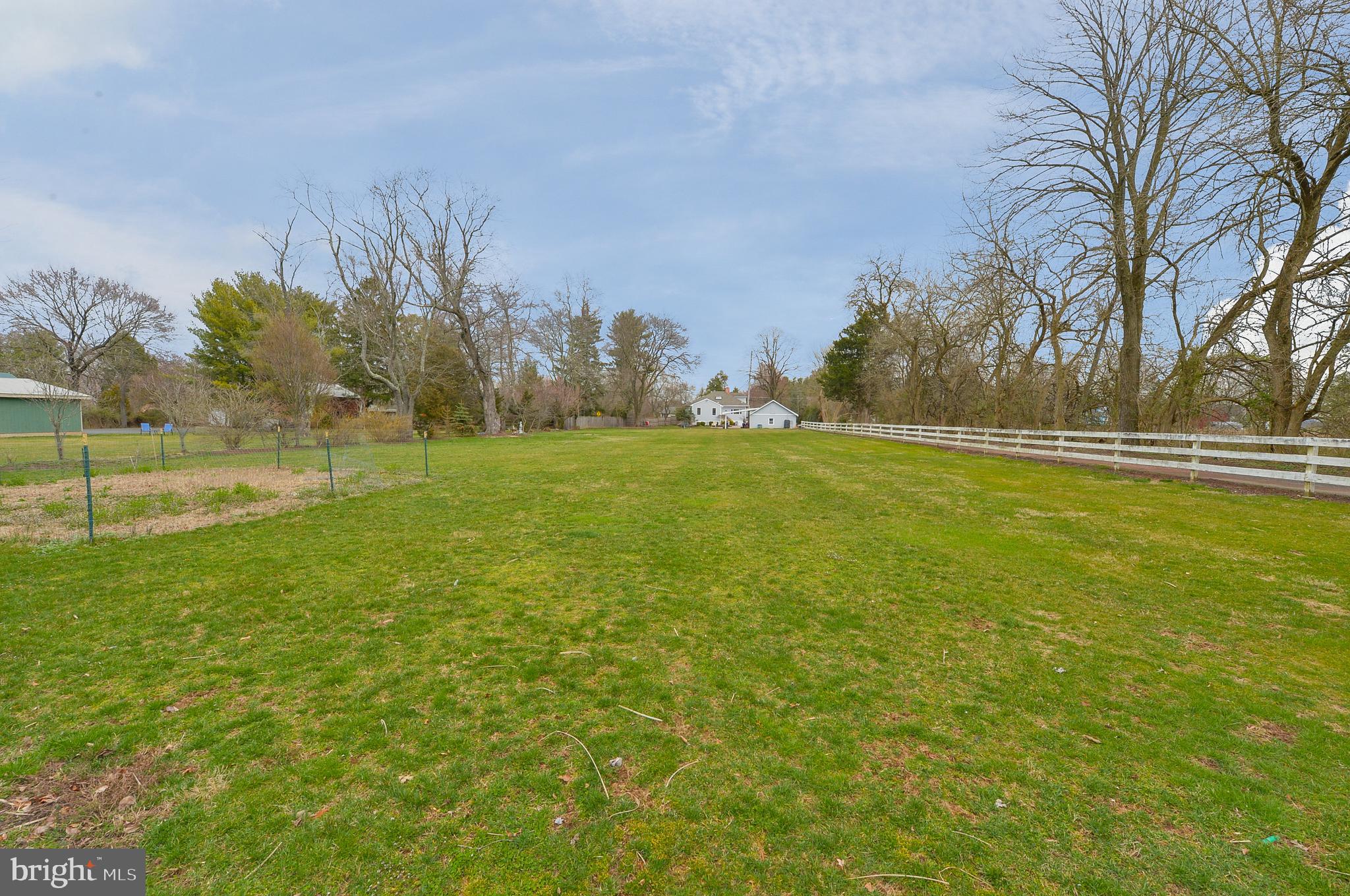 922 Route 601 Skillman Nj 08558 Skillman, NJ 08558 - Photo 55 of 59 a view of a field with trees in the background