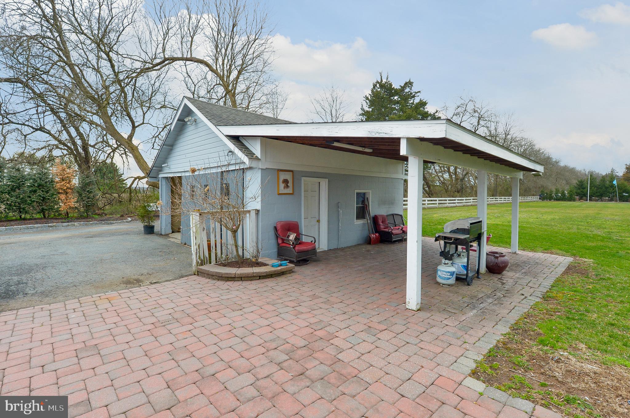 922 Route 601 Skillman Nj 08558 Skillman, NJ 08558 - Photo 8 of 59 a view of a house with backyard and porch
