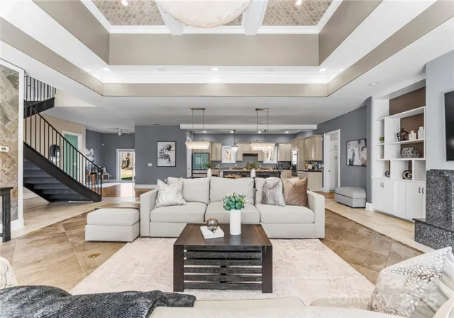 a living room with furniture and a rug