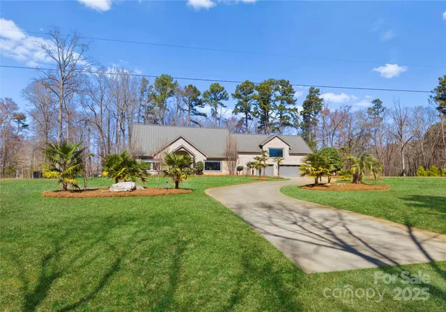 a view of a park with large trees