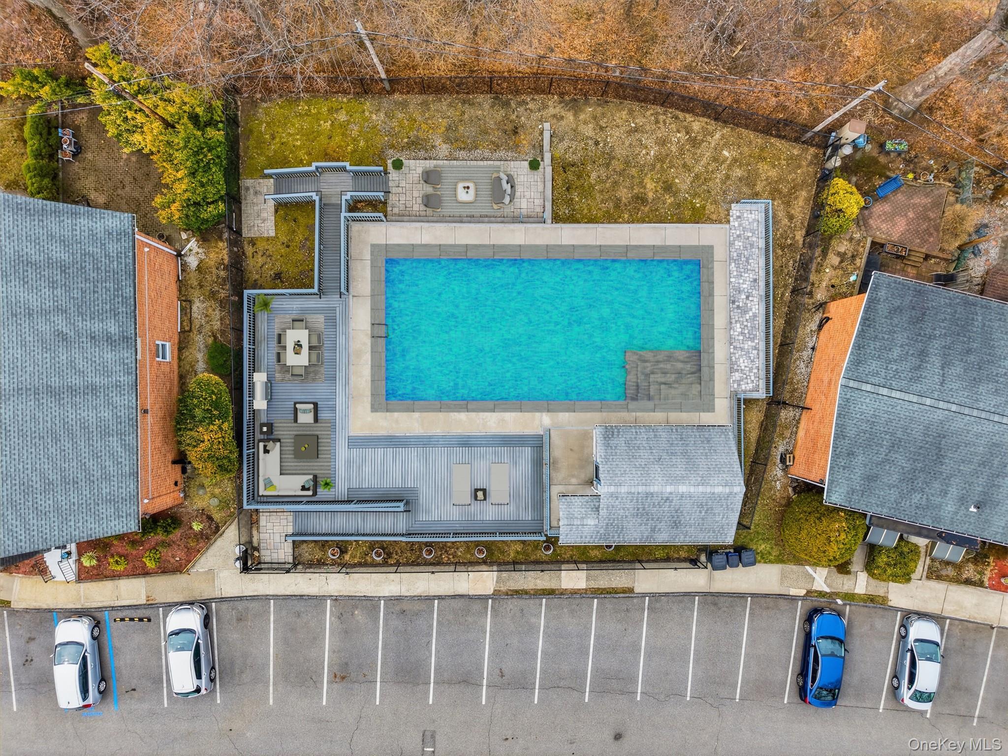667 Pelham Road, Unit B10 New Rochelle, NY 10805 - Photo 13 of 16 a view of a brick house with many windows