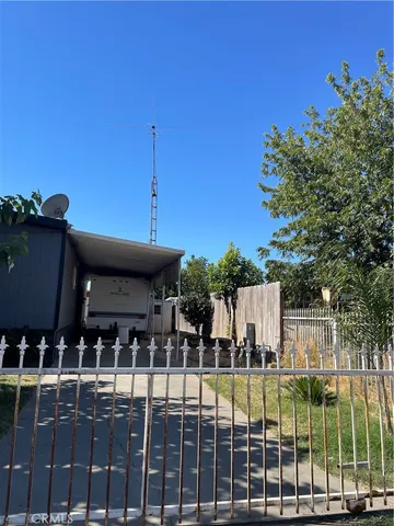 a view of a balcony with chairs