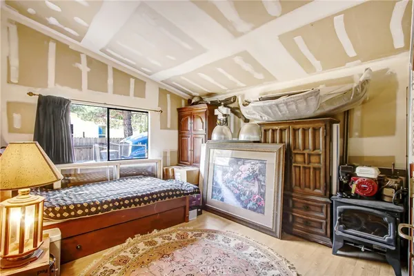 a living room with furniture fireplace and flat screen tv