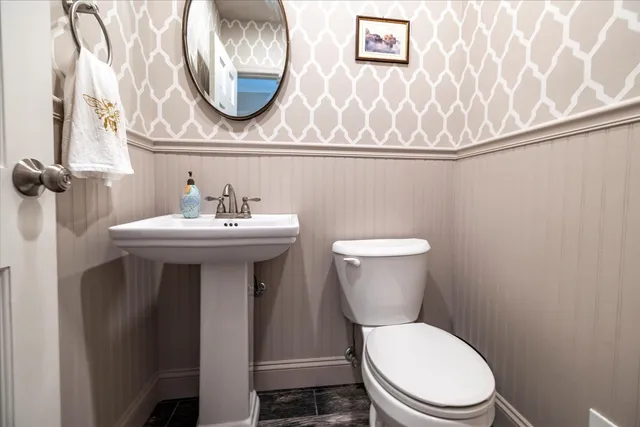 a bathroom with a sink and a toilet