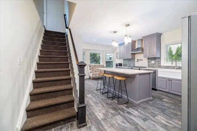 a kitchen with sink cabinets and outdoor view