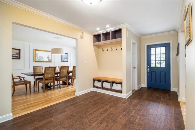 a view of a livingroom with furniture and wooden floor