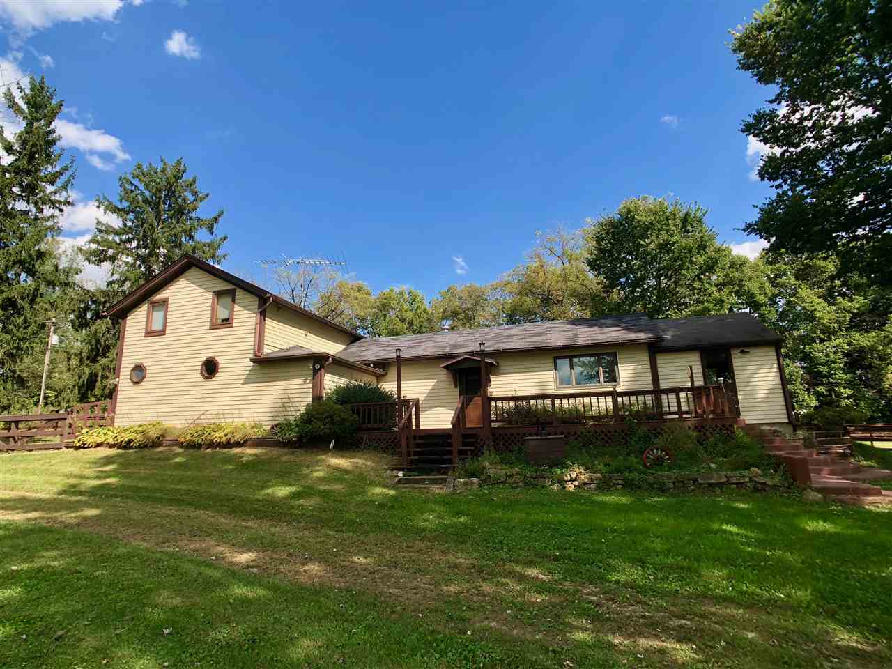 6038 Tipple Road Rockford, IL 61102 - Photo 1 of 25 a front view of house with yard and green space