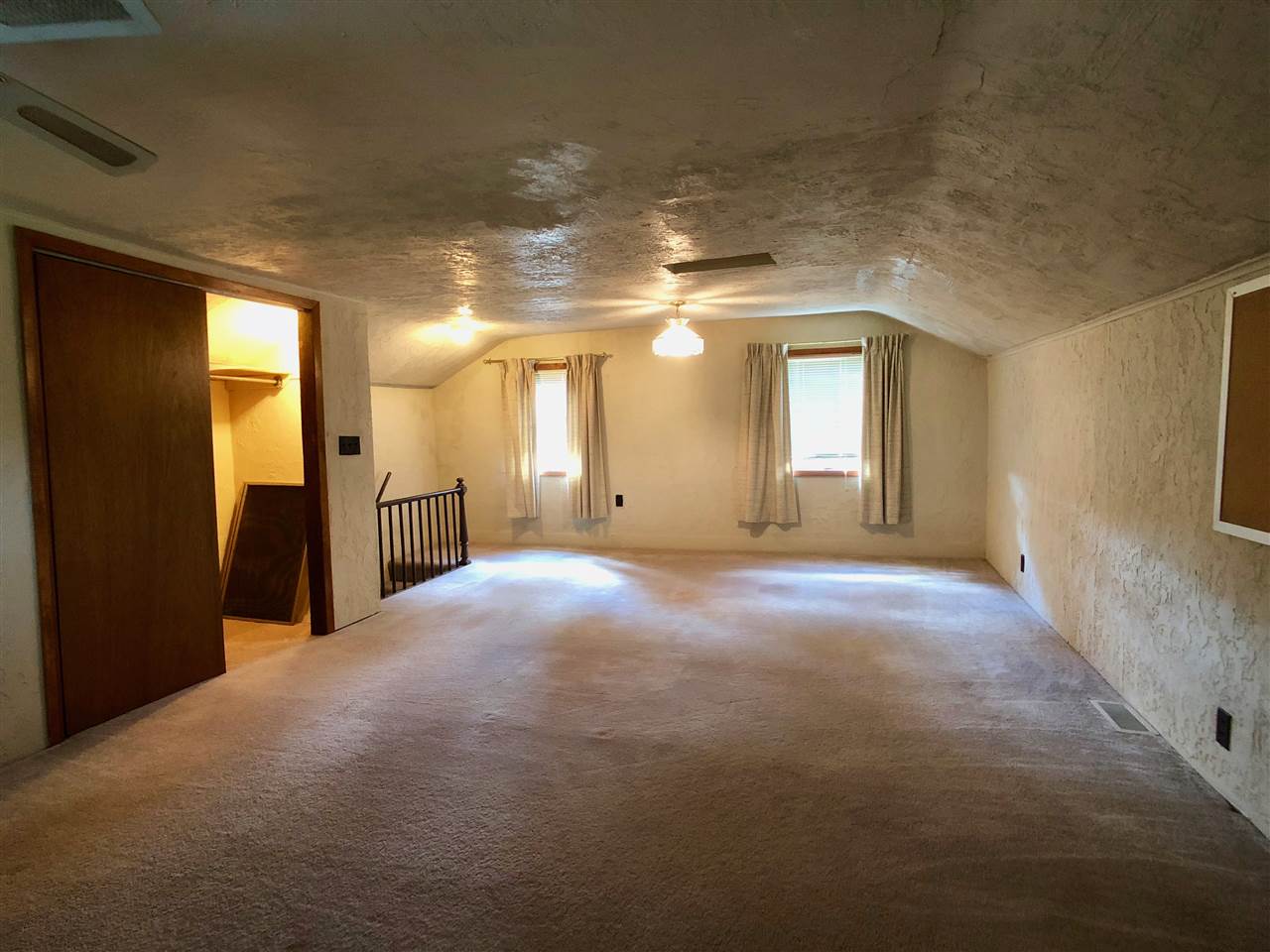 6038 Tipple Road Rockford, IL 61102 - Photo 14 of 25 a view of a hallway with windows