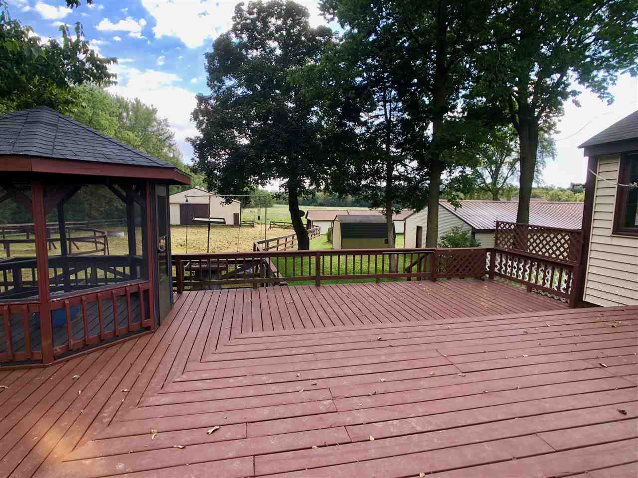 6038 Tipple Road Rockford, IL 61102 - Photo 16 of 25 a view of a patio with wooden floor