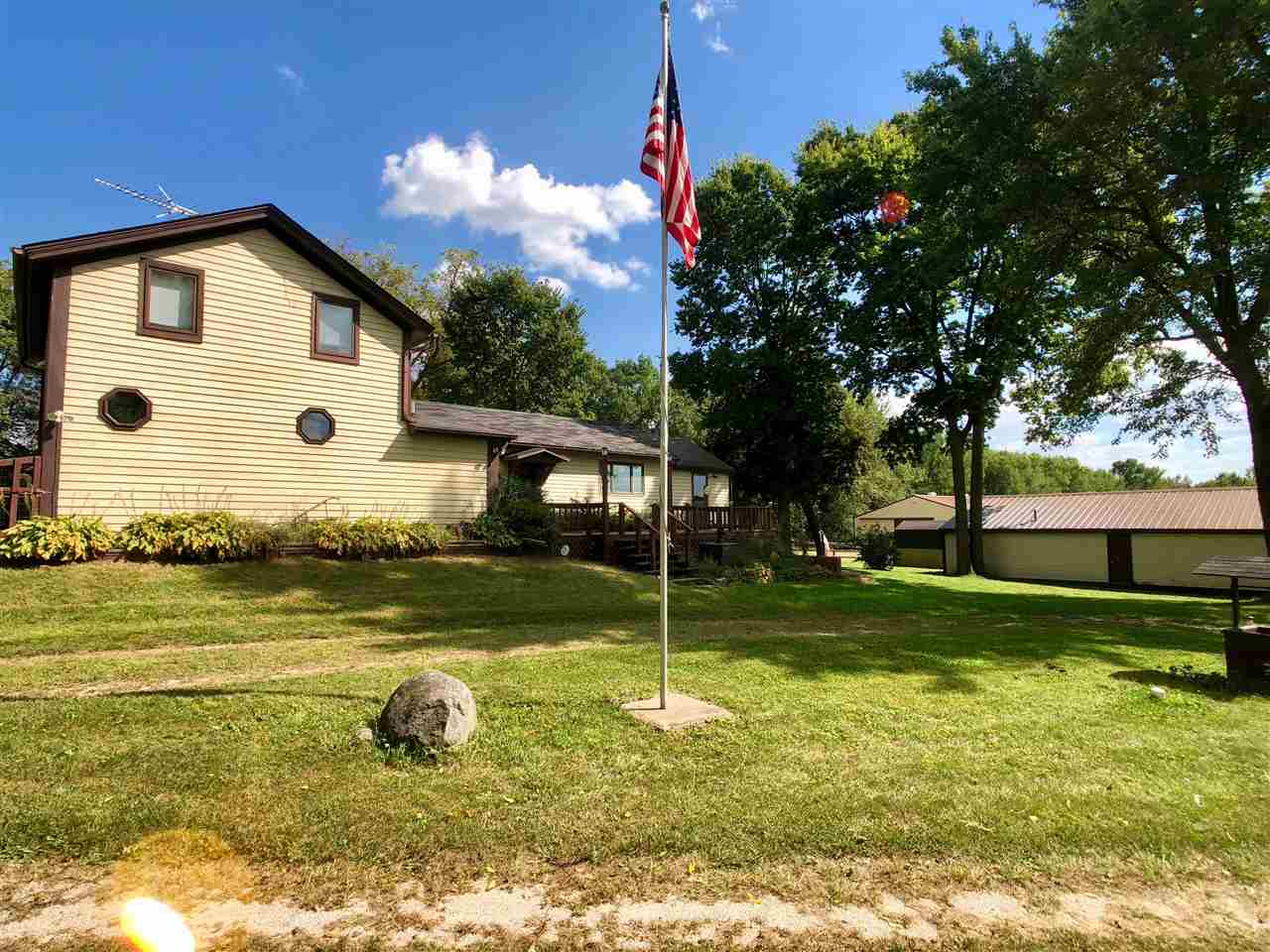 6038 Tipple Road Rockford, IL 61102 - Photo 2 of 25 a view of a house with a yard