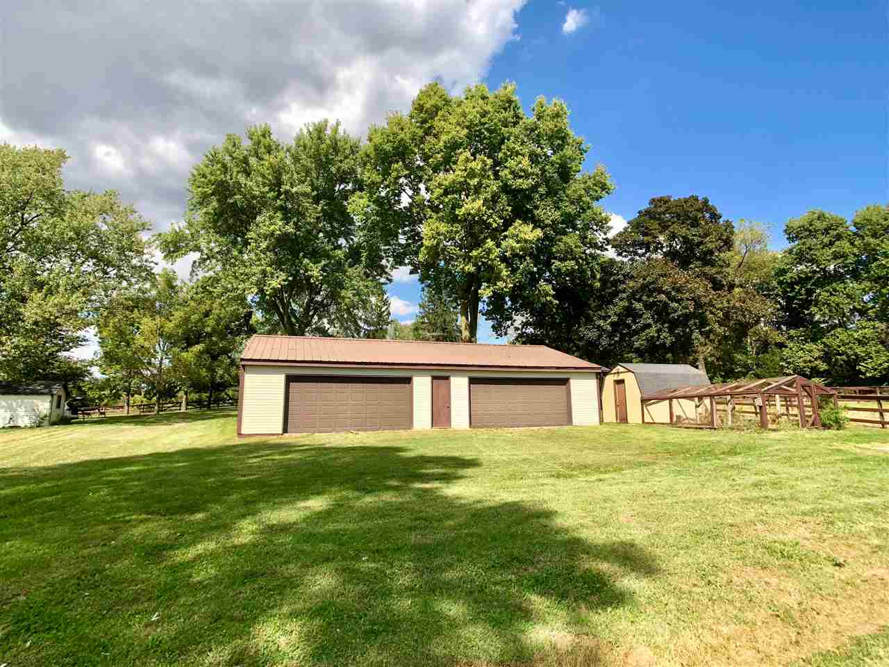 6038 Tipple Road Rockford, IL 61102 - Photo 24 of 25 a view of a house with a yard