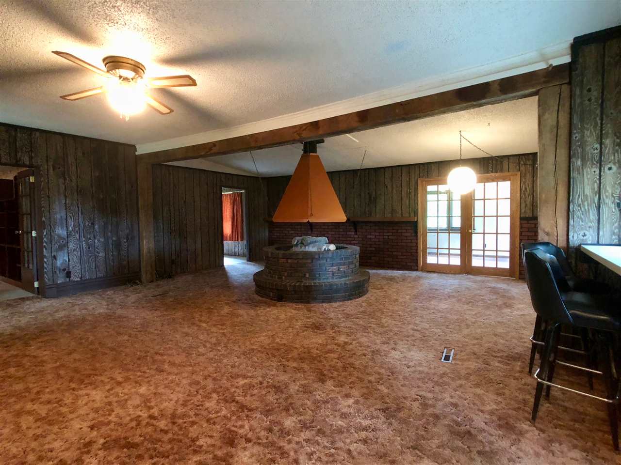 6038 Tipple Road Rockford, IL 61102 - Photo 10 of 25 a living room with furniture and a flat screen tv