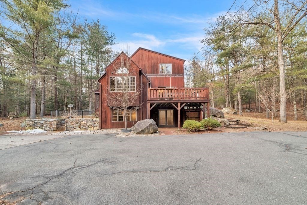 1 St Germain Road Hampden, MA 01036 - Photo 3 of 42 a view of a house with large space and a car park in front of house
