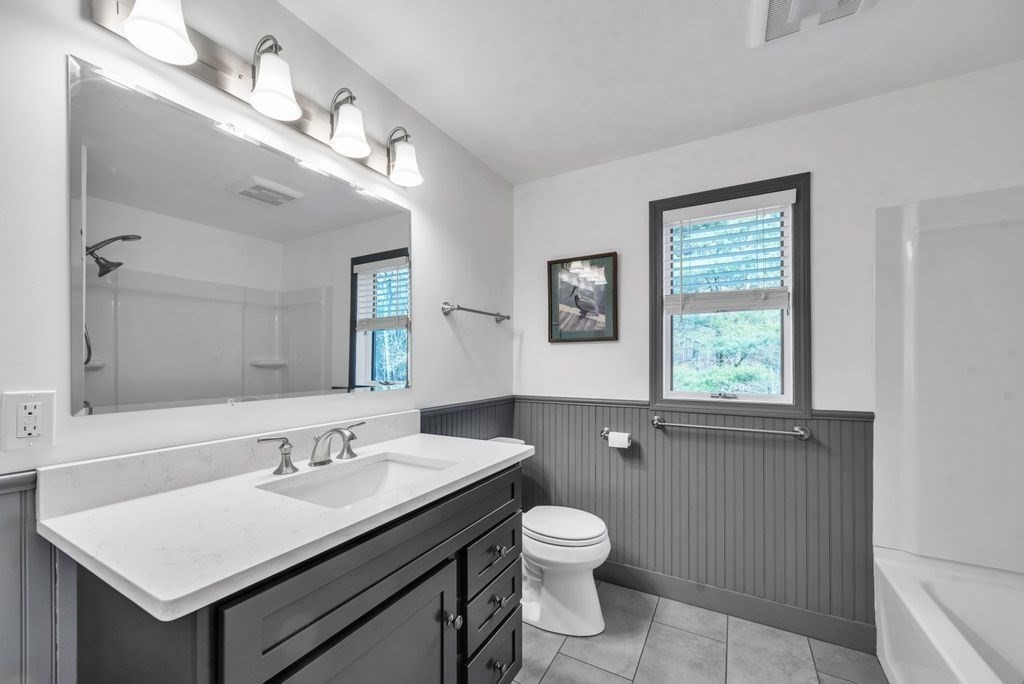 1 St Germain Road Hampden, MA 01036 - Photo 33 of 42 a bathroom with a sink vanity and a toilet