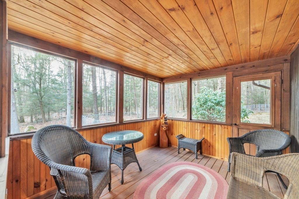 1 St Germain Road Hampden, MA 01036 - Photo 8 of 42 a living room with furniture and a large window
