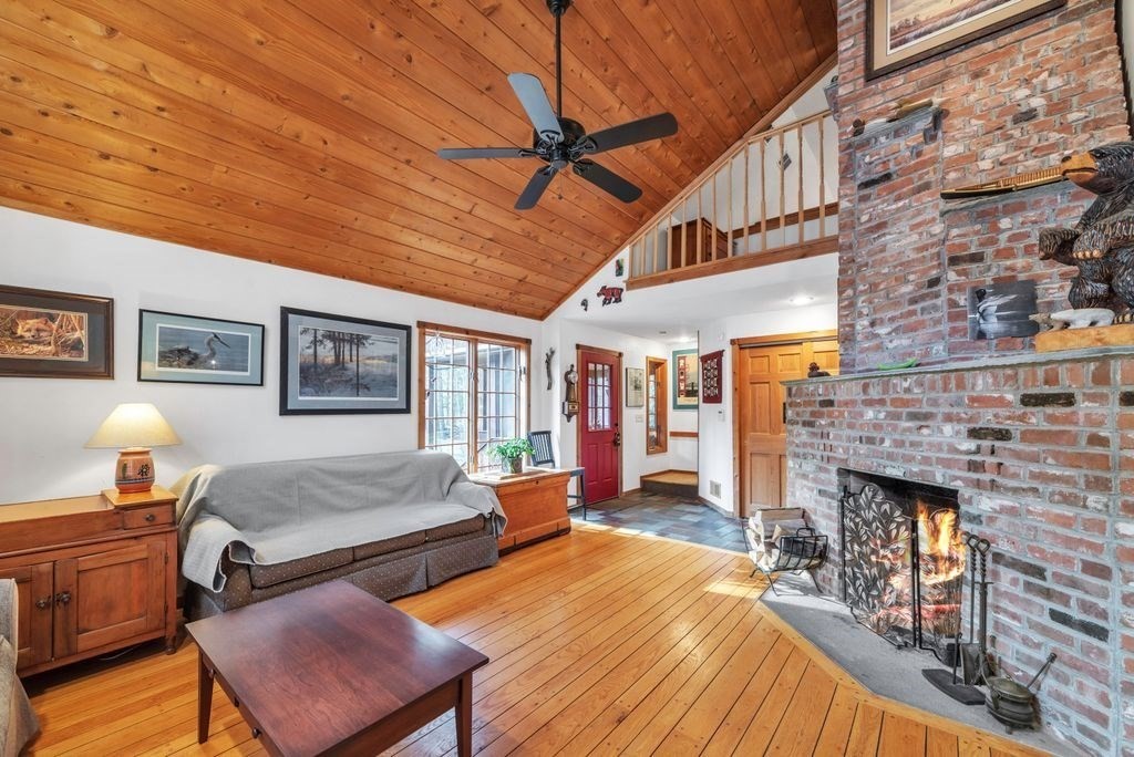 1 St Germain Road Hampden, MA 01036 - Photo 10 of 42 a bedroom with furniture and a fireplace