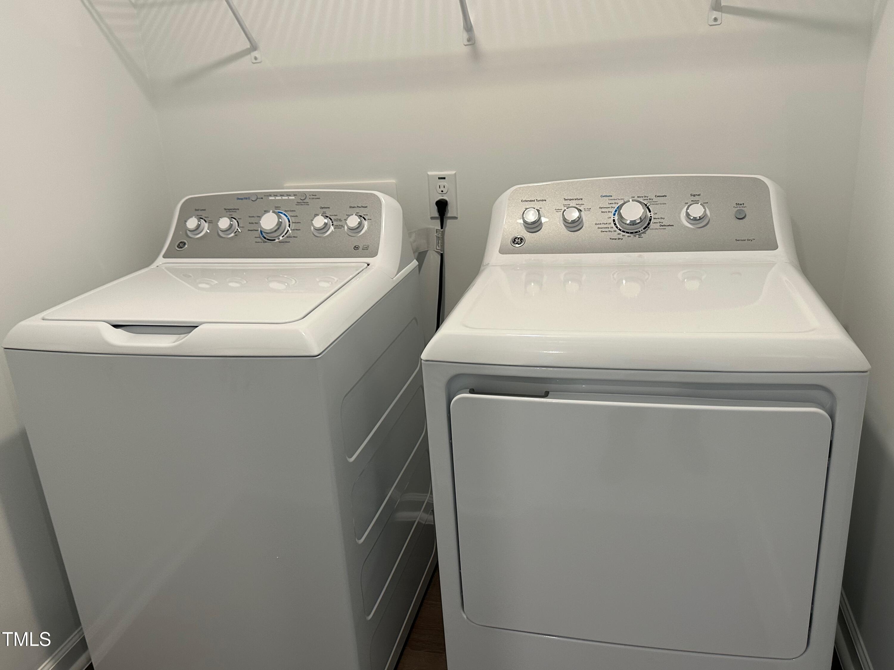 3008 Vitner Drive Durham, NC 27704 - Photo 13 of 17 a utility room with dryer and washer