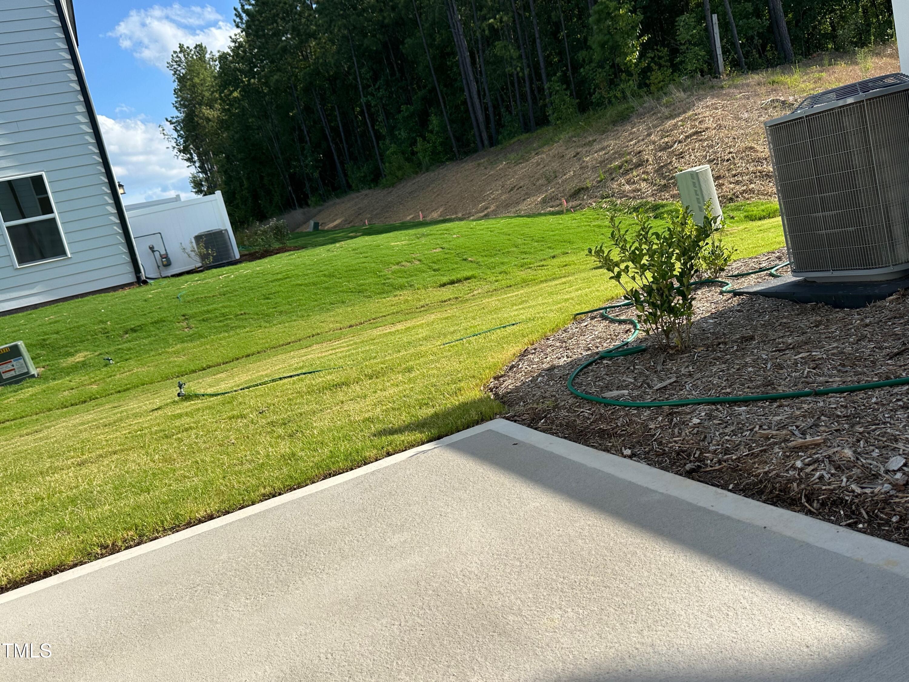 3008 Vitner Drive Durham, NC 27704 - Photo 15 of 17 a view of a backyard with plants